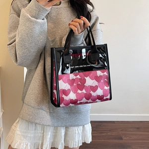 Borsa tote in PVC trasparente con motivi a cuore e manici neri per cosmetici