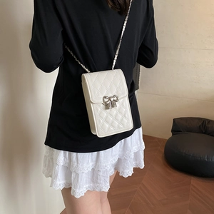White quilted mini square crossbody bag with silver bow buckle and chain strap