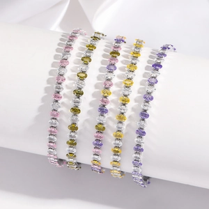 Adjustable stainless steel tennis bracelets featuring oval-cut colorful cubic zirconia stones