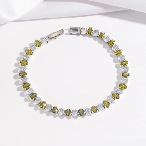Tennis bracelet with green and white cubic zirconia stones in silver stainless steel