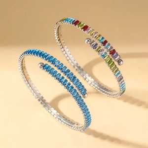 Elegant stainless steel bangles featuring colorful rectangular zircons in a set