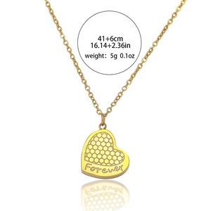 Golden heart necklace featuring honeycomb texture and Forever engraving, 41+6cm length