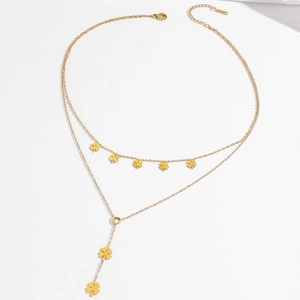 Double layered gold stainless steel necklace featuring clover and heart pendants