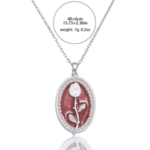 Collier vintage en acier inoxydable avec pendentif tulipe en émail rouge et argent