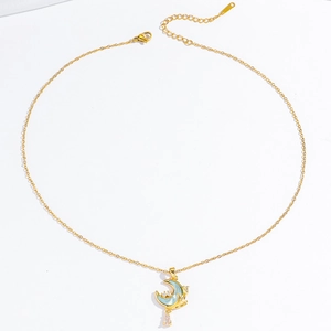 Elegant gold celestial necklace featuring a blue moon pendant with sparkling zircon accents