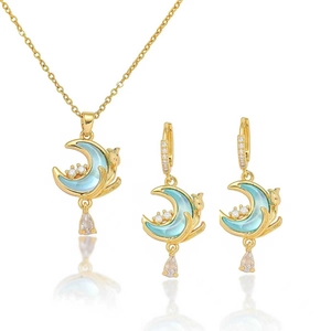 Golden moon and cat jewelry set with blue opal and zircon necklace and earrings