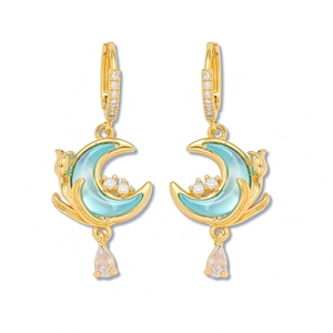Golden moon earrings with blue enamel, white zircons and teardrop pendants in a pair