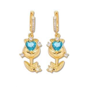 Elegant gold tulip earrings with heart-shaped blue zircon and pavé white diamonds