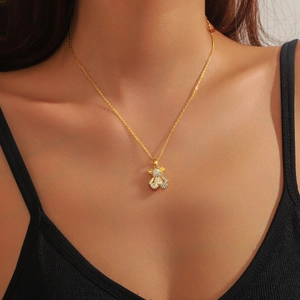 Collier élégant en or pour femme avec pendentif ours scintillant en cristaux clairs