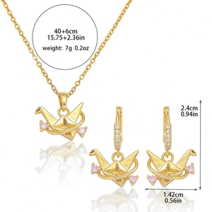Golden origami crane necklace and earring set with pink zircon accents for women