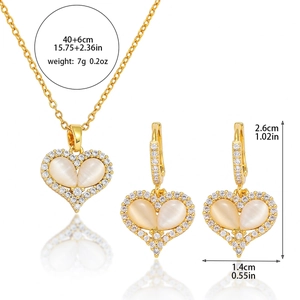 Parure de bijoux cœur œil de chat avec collier et boucles d'oreilles en acier doré