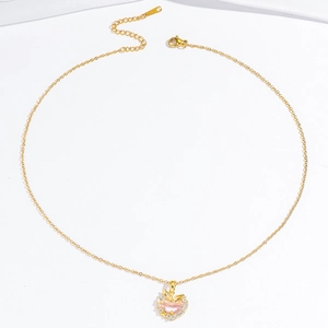 Elegant gold heart pendant necklace with pink teardrop stone and zircon on white background