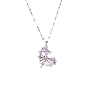 Collier avec pendentif cœur rose, nœud argenté et accents de perles d'imitation