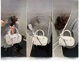 Detailed views of a white lace bowling bag shown in handheld, crossbody, and shoulder styles