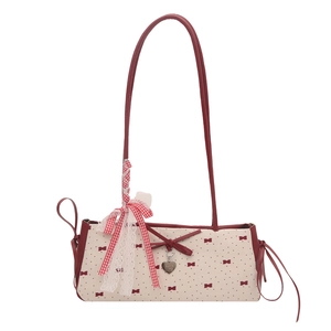 Contrast color large capacity baguette bag with red polka dots and bow detail