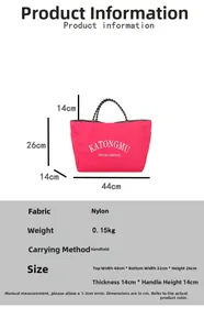 Detail view of pink nylon tote bag with white lettering and size dimensions specs