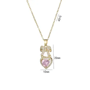 Collana con ciondolo a cuore rosa, fiocco dorato e zirconi per donne eleganti