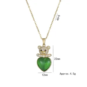 Golden titanium steel bear necklace with green heart zircon pendant and crystal accents