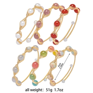 Set of 6 gold wire-wrapped open bangles with colorful crystal pearls and stones