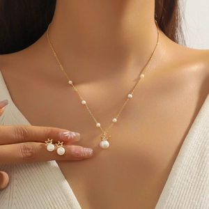 Elegant freshwater pearl jewelry set with golden crown pendant necklace and stud earrings