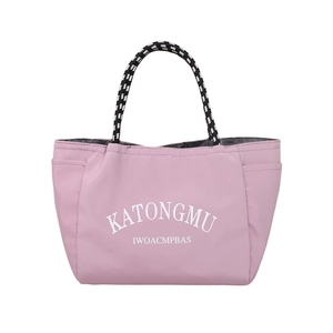 Waterproof nylon tote bag in pale pink with rope handles and letter print on white background