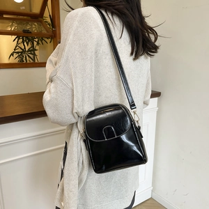 Retro black glossy crossbody phone bag with contrast stitching and adjustable strap