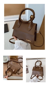 Close-up of brown PU leather bag featuring a round handle and gold JINGPIN metal logo