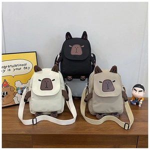 Three cute capybara canvas crossbody bags in black, beige and khaki colors with embroidery