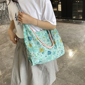 Floral canvas tote bag with large capacity and colorful prints for casual daily use