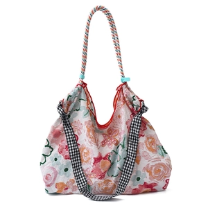 Floral canvas tote bag with large capacity and colorful braided rope handles