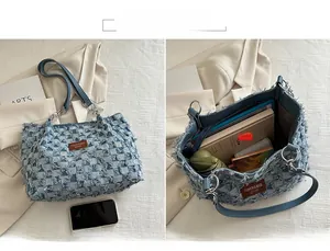 Detail view of denim patchwork tote interior and exterior with spacious storage