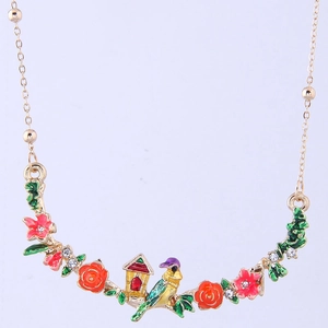 Enamel floral necklace featuring red roses, pink cherry blossoms, and a bird on a gold chain
