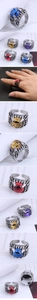 Detailed view of Gothic claw rings featuring colorful eye stones in red, blue, and yellow