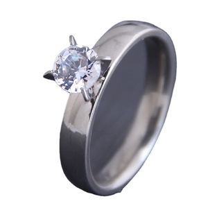 Minimalist stainless steel ring with single round zircon stone in classic 4-prong setting