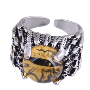 Gothic style silver claw ring featuring a detailed amber dragon eye in an open design