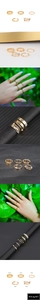 Detailed views of a 5-piece gold-plated ring set with star engraving and textured bands