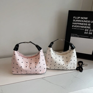 Fashionable half-moon handbags with ribbon patterns in pink and white colors