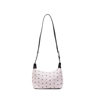Pink underarm bag with black bow polka dots and adjustable leather strap on white background