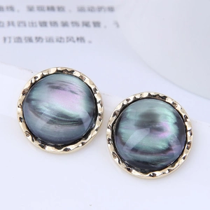 Elegant 925 silver studs with iridescent resin inlay and hammered gold textured borders