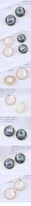Detail of vintage round stud earrings with shell inlay and textured gold-tone edges