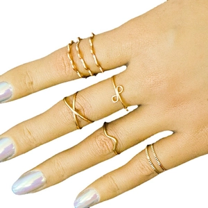 6pcs gold stacked ring set featuring wave and infinity designs on fingers