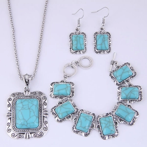 Parure de bijoux bohème argentée avec pierres turquoises rectangulaires et gravures