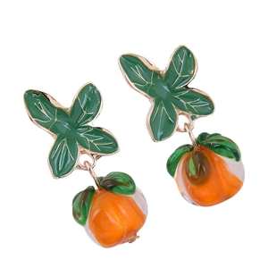 Fashionable floral petal stud earrings with orange fruit drop pendants in gold finish