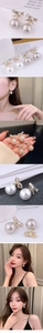 Detail of bowknot stud earrings with micro-pave diamonds and hanging lustrous pearls