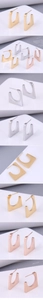 Detailed view of U-shaped geometric earrings in gold, silver and rose gold finishes