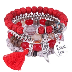 Bohemian multilayer beaded bracelet set with red tassel, silver wings and heart charm