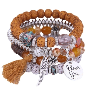 Bohemian multilayer bracelet set with heart pendant wing charm and brown tassels