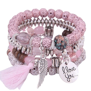 Bohemian multi-layer pink beaded bracelet with silver feather and heart tassels