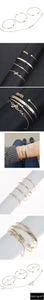 Dettaglio del set di 4 bracciali dorati con barra Amour e ciondolo Love con dimensioni
