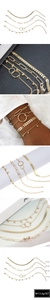 Dettagli del set di 4 bracciali dorati con ciondoli a foglia, graffetta e pallina